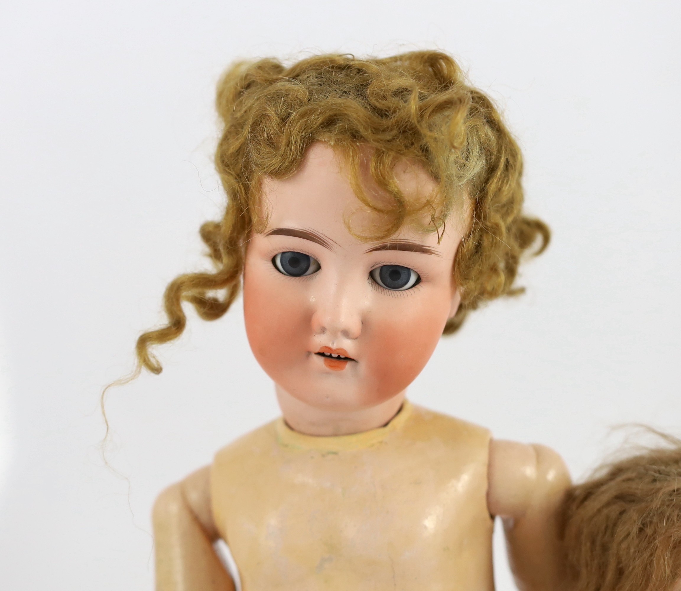 A bisque doll, German, circa 1900, 12in.